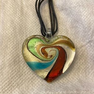 Heart Shaped Lampwork Glass Art Pendant. Swirls of silver, brown, blue, green